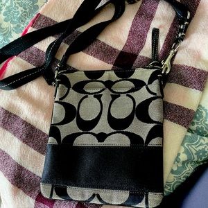 Coach black crossbody bag.